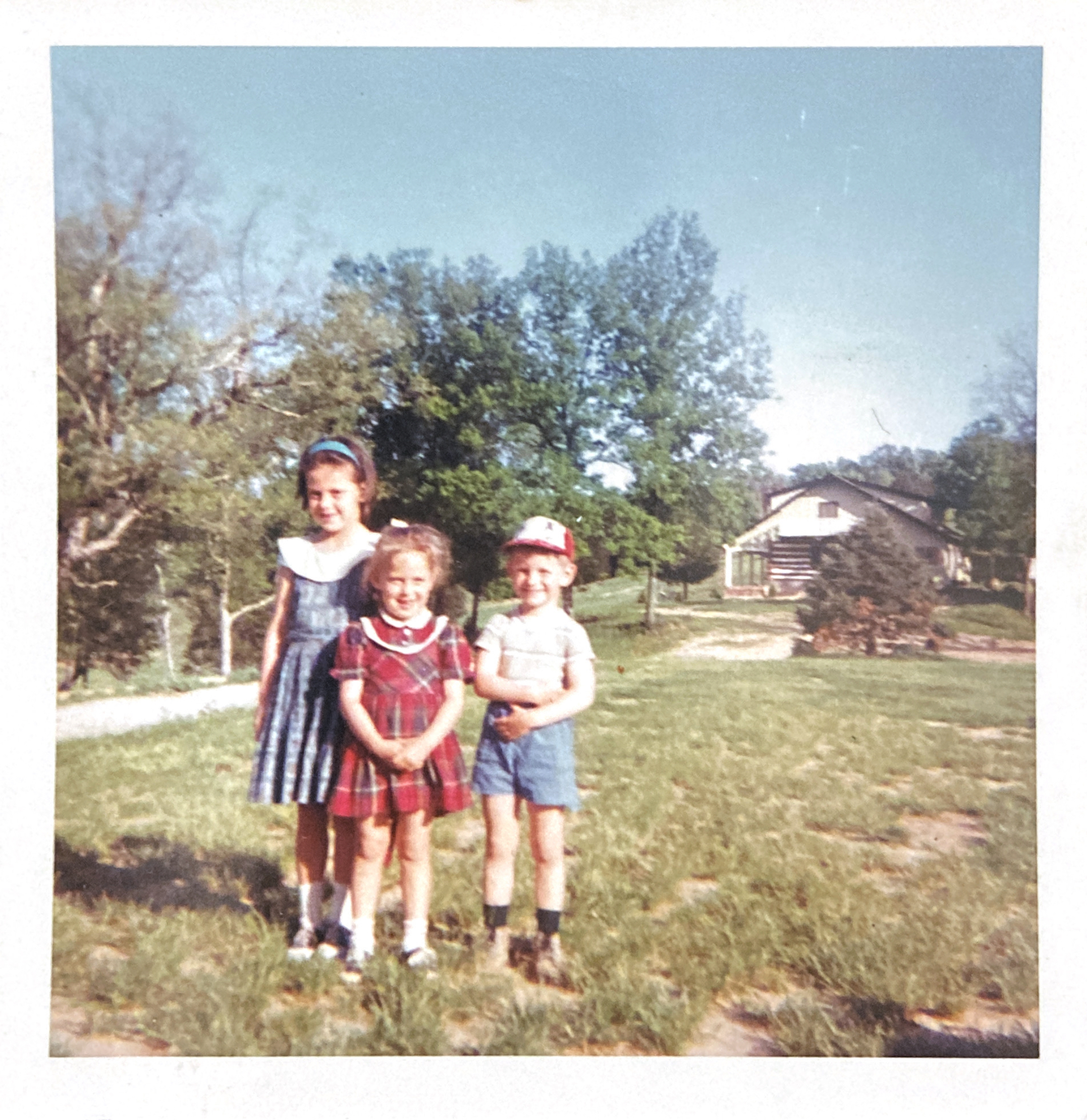 May 1966, Linda and Sue with Alan Butts, Bob and Barbara’s boy. The log house at this time was known as Ryans’ House